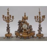 Gilt brass French clock garniture.