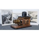 A Victorian mahogany, lacquered brass and tin lantern projector, (converted to electricity),