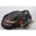 Collection of vintage handbags, black and rose pink beaded bag, needlepoint bags,