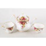 Royal Albert Old Country Roses teaware, teapot, cups with saucers, dinner plates and cake plates.