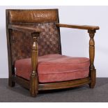 Stained beechwood low armchair, leatherette back, octagonal urn-shape supports, 55cm.