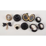 A collection of jet and cameo brooches, earrings, locket,