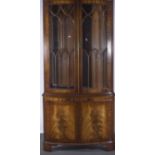 Reproduction Victorian style mahogany bowfront freestanding corner cabinet, dentil cornice,