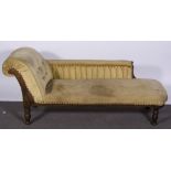 Late Victorian oak framed chaise longue, scroll end, roll-back, turned and ringed legs,