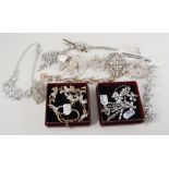 A collection of white paste set jewellery - brooches, earrings,