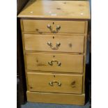 Small pine chest, with a rectangular top and moulded edge, fitted with four graduating drawers,