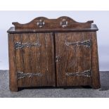 Late 19th Century tobacco cabinet, stained oak case,Arts and Crafts style, W53cm.