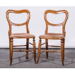 Pair of beech balloon-back single chairs, mahogany pedestal bedside cabinet,