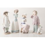 A modern Lladro figural group, Ballerinas, and a collection of Nao Spanish porcelain figures, (14).