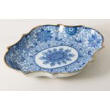 Staffordshire Pottery lozenge-shaped dish, Oriental design, blue underglaze, gilt rim, 28cm.