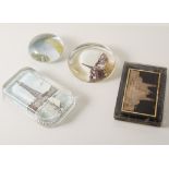 Six glass paperweights,