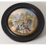 A Pratt Ware pot lid 'The Picnic', figures seated with a ruined abbey in the background,