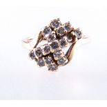 A diamond cluster ring, sixteen brilliant cut diamonds, (one missing),
