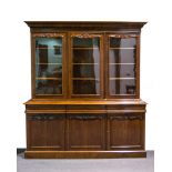 Victorian mahogany triple bookcase, ogee moulded cornice,