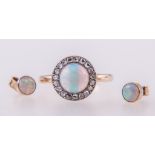 An opal and diamond cluster ring and pair of earstuds,