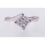 A diamond four stone crossover ring,