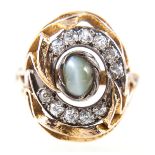 Tom Payne and Peter Triggs - A chrysoberyl cats eye and diamond dress ring,