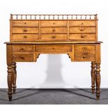 Victorian oak desk, raised superstructure with three banks of three drawers,