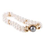 A two row cultured pearl bracelet, forty-eight 6.