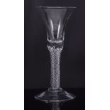 Bell bowl wine glass, mid 18th century, multiple spiral air twist stem. 17cm.