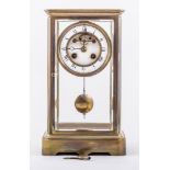 French brass 'four glass' mantel clock, white enamelled dial with visible escapement,