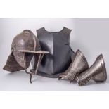 A civil war style lobster type helmet, a small breastplate, height 32cms and two wristplates, (4).