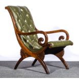 Victorian rosewood easy chair, scrolled frame and arms, the legs joined by fan spandrels,