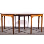 George III mahogany dining table, formed as two D-shaped ends, each with a plain frieze,