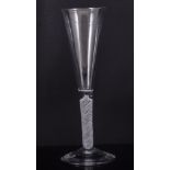 Tall trumpet shape champagne glass, second half 18th century, with a multi series opaque-twist stem,