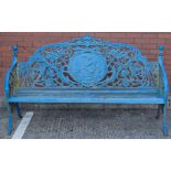 Coalbrookdale style cast iron garden bench, oval back decorated with a girl and dove,