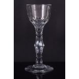 Facet cut wine glass, late 18th century, ogee bowl, eight-sided diamond faceted and knopped stem,