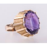 An amethyst dress ring, the oval faceted amethyst 16.5mm x 13.