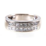 A diamond two row half eternity ring,