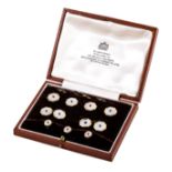 A cased set of 9 carat yellow gold dress studs, comprising a pair of cufflinks,