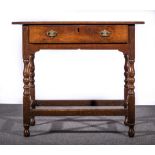 Joined oak side table, basically 18th century, two plank top, fitted with a single frieze drawer,