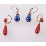 Two pairs of earrings, a pair of coral torpedo shaped 35mm drops with coral button stud to top,