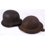 World War II 'Tommy' helmet, with chin strap and a German Naval tin helmet, with side decal,