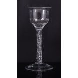 Flared lip ogee bowl wine glass, mid 18th century, the bowl with light spiral moulding,