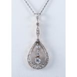 A diamond set pendant and chain,
