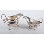 Silver sauce boat, George III style, gadrooned outline, leaf-capped C-scrolled handle,