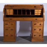 Victorian walnut cylinder front desk, twin pedestals, satinwood and rosewood lined interior,