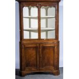 Welsh oak standing corner cupboard with glazed upper section, bracket feet, width 104cm,