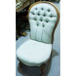 Victorian walnut nursing chair, upholstered in patterned brocade, 106cm high.