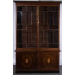 Late Georgian mahogany bookcase, plain cornice above a frieze,