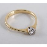 A diamond solitaire ring, the brilliant cut stone,