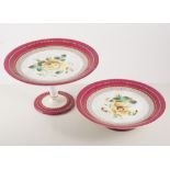 A Victorian bone china part dessert set, painted with botanical sprays, puce border,