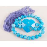 A collection of modern jewellery - a turquoise howlite bead bracelet with heart shaped disc,