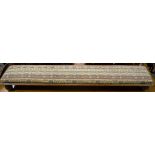 19th Century long footstool with upholstered top, 105cm long, 19cm deep, 9cm high.