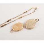 Two oval gold coloured lockets , two yellow metal chains weighing approximately 13gms.