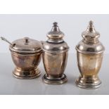 A silver three piece condiment set, (worn and damaged), approximate weight 5oz.